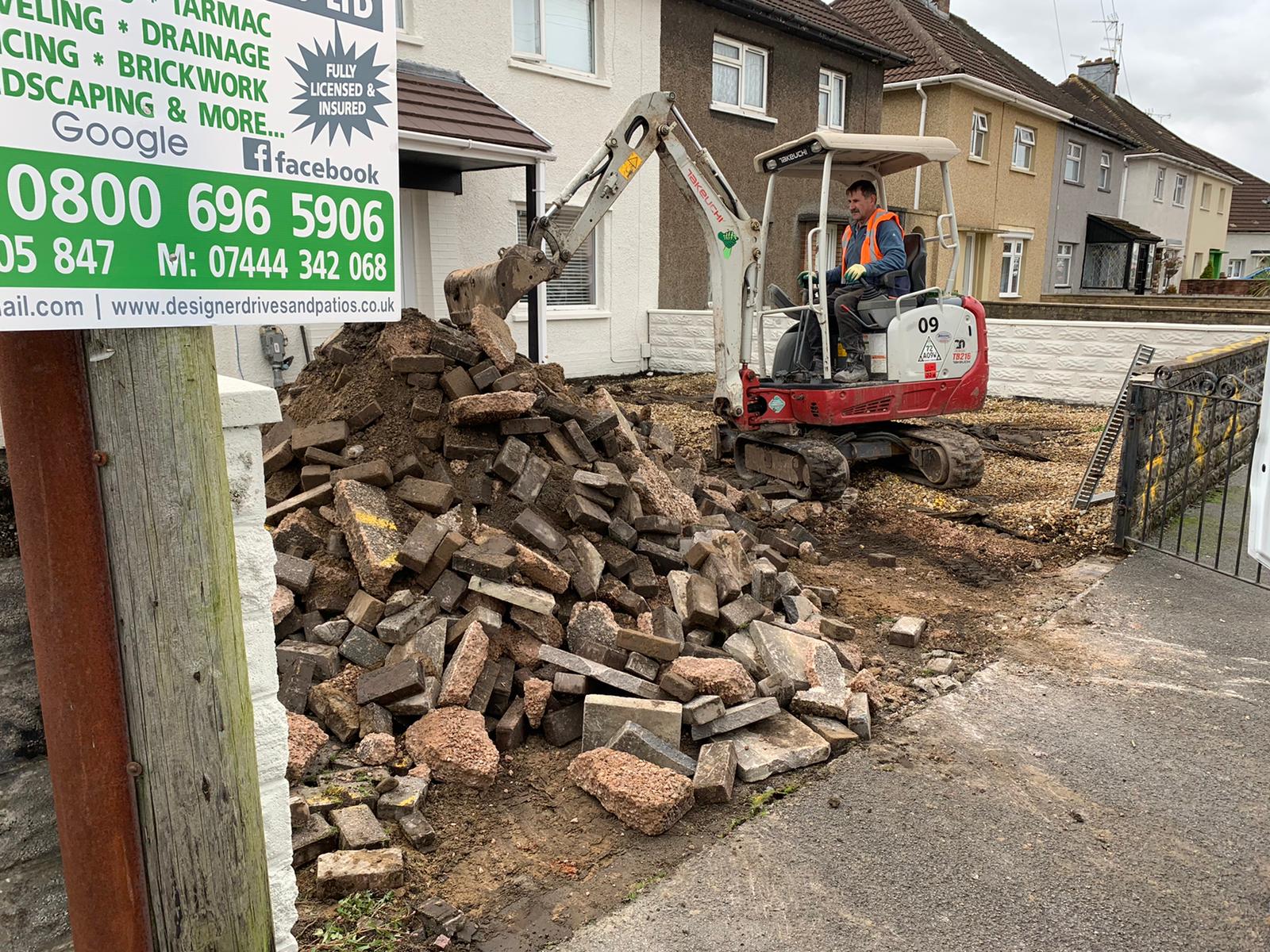 Excavation and groundworks in progress before a new driveway