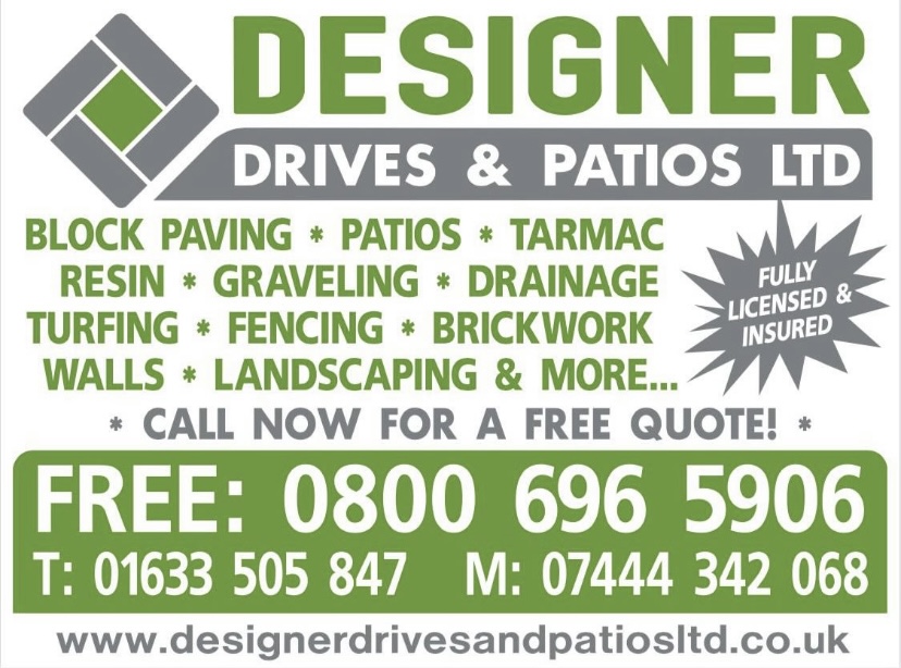 Designer Drives and Patios site signboard listing block paving, patios, tarmac, resin, graveling, drainage, turfing, fencing, brickwork, walls and landscaping